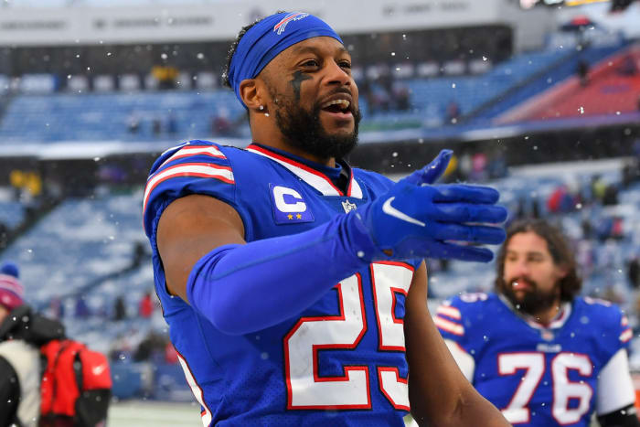 Taiwan Jones smiles as he leaves the field after a December 2021 game